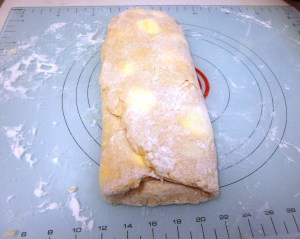 Folding final third over to form a rectangle.