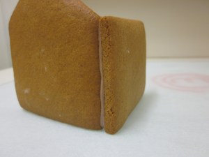 2. Attach one of the side pieces to the front